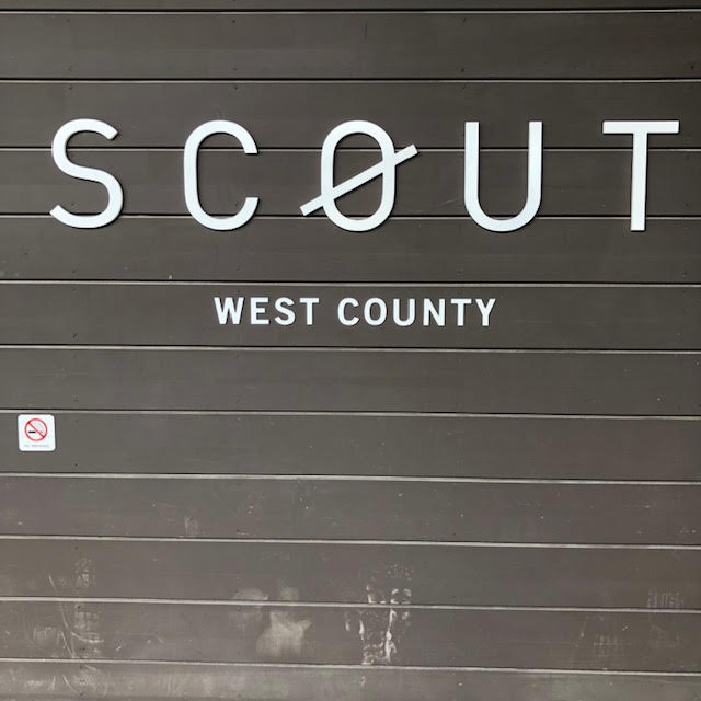 Scour West County Logo On Wall